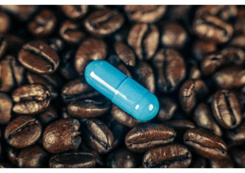 Caffeine Supplement Pill And Coffee Beans